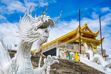 Nakhon Sawan, Thailand - March, 23, 2022 : Dragon head sculpture at Shrine Serpent king Chan Sen Is a Chinese style temple Created for people to worship gods. - obrazy, fototapety, plakaty