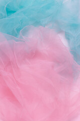 Abstract colorful background, pink and blue light wrinkled fabric