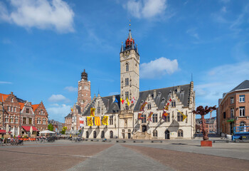 Dendermonde, Belgium. View of historic building of Town Hall with belfry tower on Grote Markt square