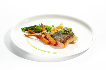 Healthy food - salmon fillet with roasted chinese cabbage and carrot. Clean eating - trout with...