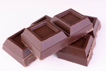 Dark chocolate isolated on white background.Close up.