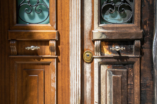 Old wooden door with handle, vignette look