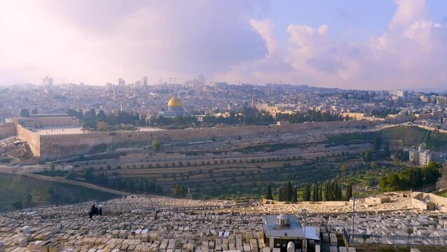 Panoramic view on Jerusalem with the Dome of the Rock from the Mount of Olives near old Jewish cemetery.