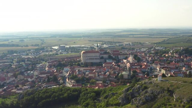 Mikulov city historic center with castle hill, panoramic drone shot.