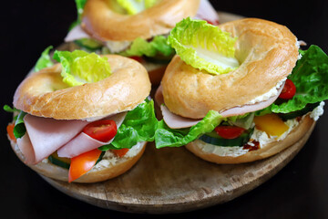 Bagel sandwiches on a dark background. Healthly food. Keto snack.