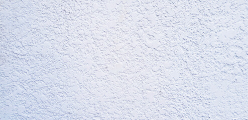 White concrete wall for background. Painted brickwork or rough wallpaper. Exterior design in loft style concept.