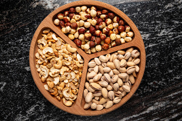 Mixed nuts in bowl , top view