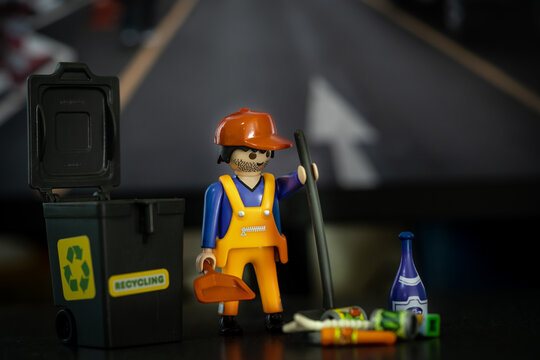 Bangkok, Thailand - May. 15, 2022: Studio shot of Lego garbage man,Legos are a popular line of plastic construction toys,manufactured by Playmobil Malta Ltd. in Malta and German.