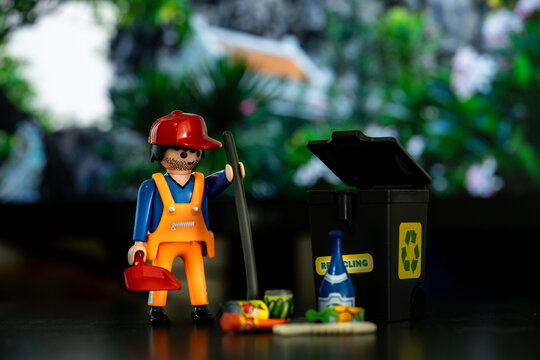 Bangkok, Thailand - May. 15, 2022: Studio shot of Lego garbage man,Legos are a popular line of plastic construction toys,manufactured by Playmobil Malta Ltd. in Malta and German.