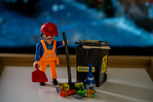 Bangkok, Thailand - May. 15, 2022: Studio shot of Lego garbage man,Legos are a popular line of plastic construction toys,manufactured by Playmobil Malta Ltd. in Malta and German.