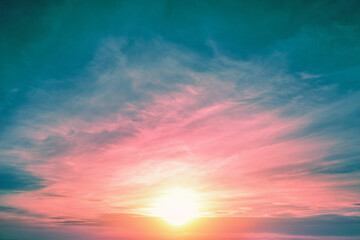 Fototapeta premium Colorful cloudy sky at sunset. Gradient color. Sky texture, abstract nature background