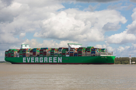 Ever Arm, world's largest container ship, on Elbe riverStade, Germany &ndash; May 12, 2022: EVER ARM , the latest ship built for Evergreen Marine Corp on Elbe river headinng to Hamburg. As of today, it is w