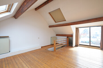 Interior attic windows and hardwood floor