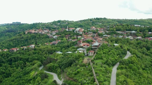 Aerial view to Sighnaghi city - georgian town Signagi in Georgia's easternmost region of Kakheti. Sighnaghi is a popular tourist destination in Georgia. Alazani valley in Georgia.