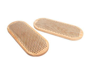 Sadhu board isolated on white background. The practice of standing on nails. Yoga concept.
