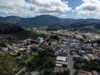 Fototapeta na wymiar small and organized country town with lots of vegetation, aerial drone view, Venda Nova do Imigrante, Espirito Santo, Brazil