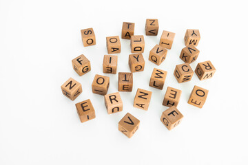 alphabets on wooden cubes on a white background