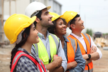 Diverse Team of Specialists engineering on Construction Site. Real Estate Building Project with Civil Engineer, Architect, Business Investor and General Worker Discussing Plan Details. - obrazy, fototapety, plakaty