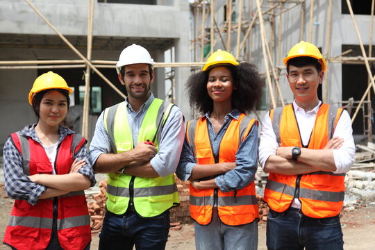 Diverse Team of Specialists engineering on Construction Site. Real Estate Building Project with Civil Engineer, Architect, Business Investor and General Worker Discussing Plan Details.
