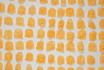 Crispy salted snacks on white background.