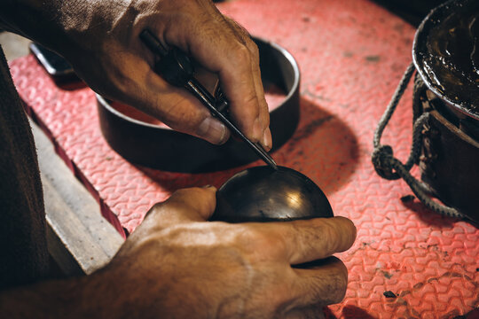Crop silversmith measuring metal detail