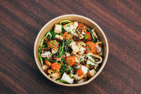 Squid rings salad in bowl