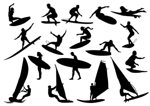 silhouettes of people surfing
