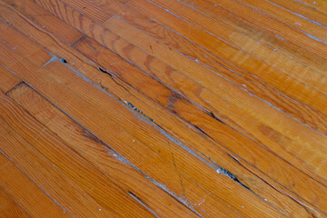 Old damaged parquet floor, top view.