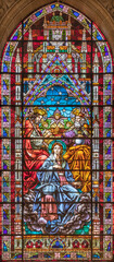 VALENCIA, SPAIN - FEBRUAR 17, 2022: The Coronation of Virgin Mary in neo-gothic stained glass of ...