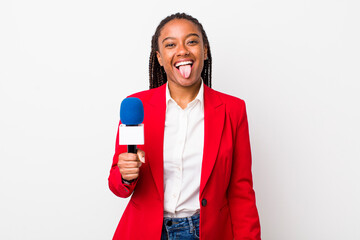 young adult black woman with cheerful and rebellious attitude, joking and sticking tongue out....