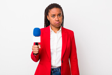 young adult black woman feeling sad and whiney with an unhappy look and crying. presenter and...