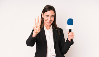 young adult pretty woman smiling and looking friendly, showing number three. presenter with a...