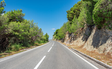 Fototapeta na wymiar Beautiful mountain landscape of the Adriatic sea coast. Highway among the mountains.