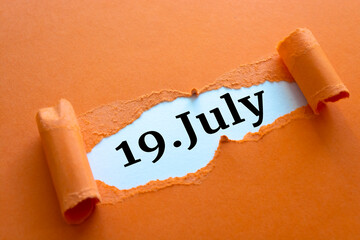 Calendar date. July 19 written under torn paper.