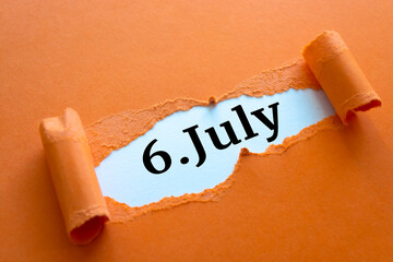 Calendar date. July 6 written under torn paper.