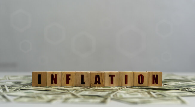 Inflation, hyperinflation in the dollar one dollar bill economic direction The concept of reducing purchasing power from inflation.
