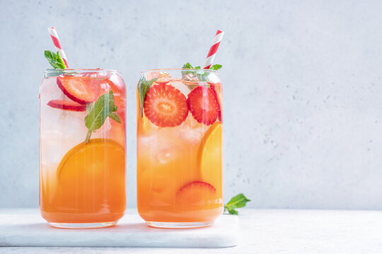 Orange Cocktail With Strawberries, Summer Drink