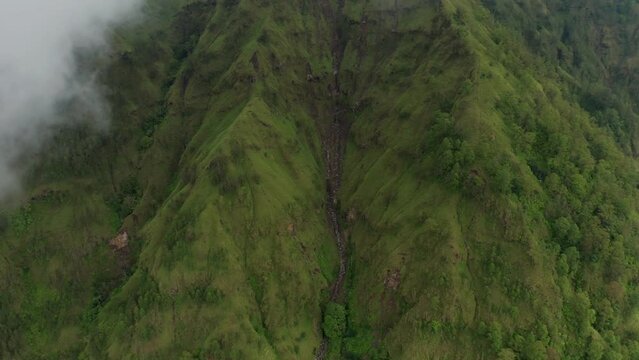 Green mountain slope in tropical Bali, Trunyan hill, aerial