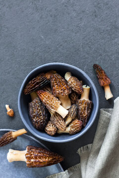 Morel mushrooms in a blue bowl