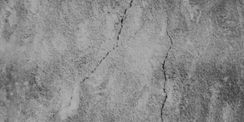 Concrete wall texture background and Texture of a concrete wall with cracks and scratches which can be used as a background.