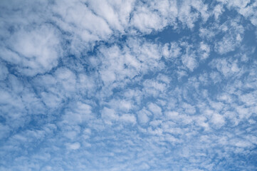 Blue sky background Small white clouds