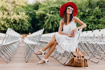 attractive happy smiling woman dressed in white dress