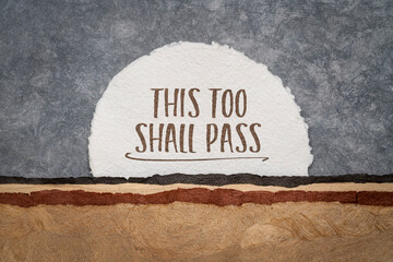 this too shall pass - inspirational handwriting on a handmade abstract paper landscape, positivity,...