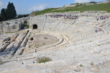 Photo of a beautiful Greek amphitheatre under the warm sun of Sicily