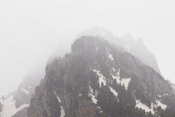 Snowy mountain in fog