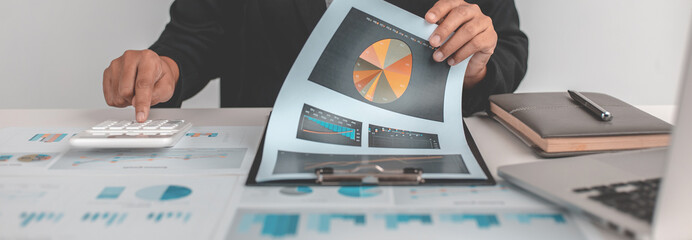 Accounting businessmen are calculating income-expenditure and analyzing real estate investment...