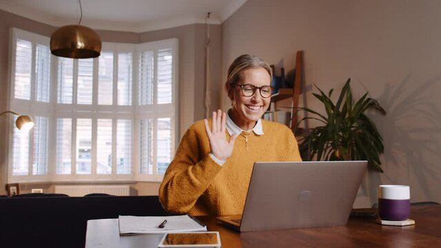 caucasian female working from home engaging in video call