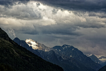 Obraz premium Dramatic fog and cloud covered peaks of the Oetztal Alps, Tyrol, Austria Europe