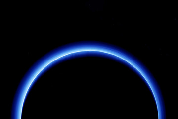Eclipse on a dark background, in blue. Elements of this image furnished by NASA