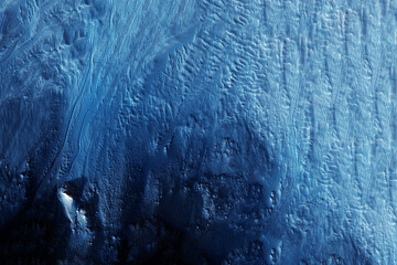 The surface of the planet Neptune. Elements of this image furnished by NASA